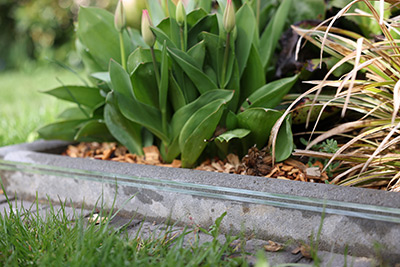 snailstop electric slug and snail fence sticks to concrete